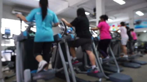 Group of  blurred young people running on treadmill Stock Footage 61851990