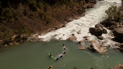 Group with body boards entering white water rapids -wide shot Stock Footage 98317681