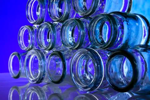 A group of bottle on blue  background Stock Photos