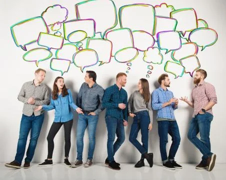 Group of boys and girls speak talking to each other. Concept of social people Stock Photos