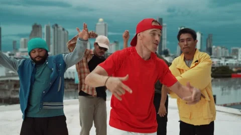 Group of break dancer putting their hands up in the air at roof top. hiphop Stock-Footage 268792995