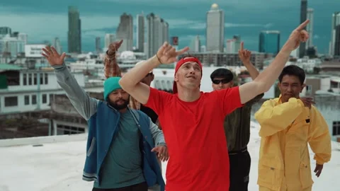 Group of break dancer putting their hands up in the air at roof top. hiphop Stock Footage 271474795