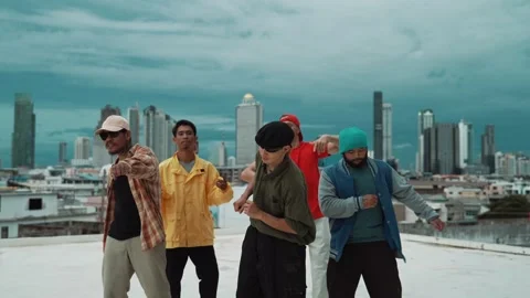 Group of break dancer putting their hands up in the air at roof top. hiphop Stock Footage 273769408