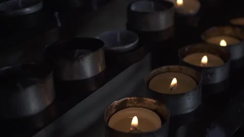 Group of burning tea light candles. Stock Footage 170516081