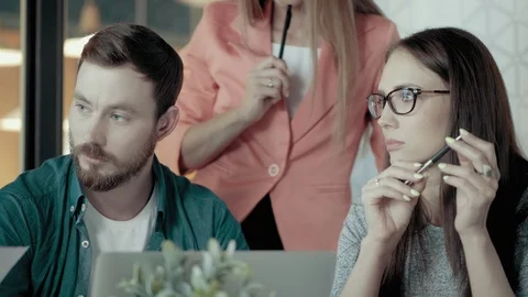 Group Of Business Creative People Using Laptop At Meeting And Discuss Stock Footage 92175140