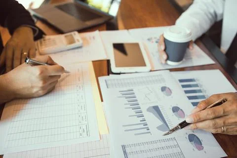 Group of business people analysis summary graph reports of business operati.. Stock Photos