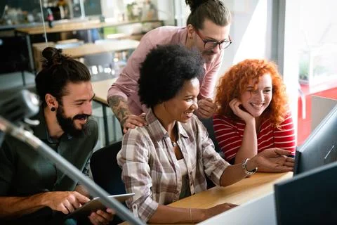 Group of business people and software developers working as a team in office Foto stock