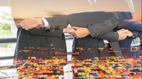Group of business people arm handshake together on double exposure the night  Stock Photos