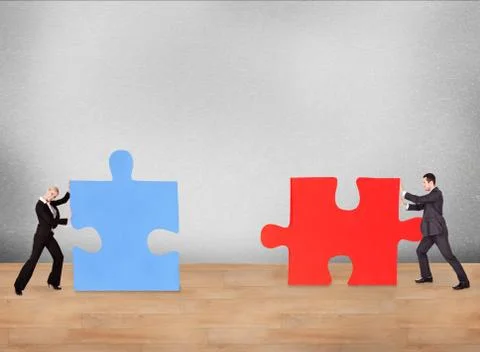 Group of business people assembling puzzle Stock Illustration