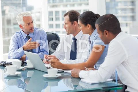 Group Of Business People Brainstorming Together