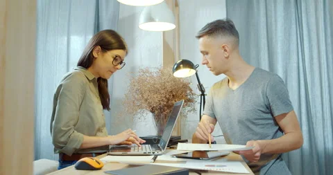 Group of business people checking the project plan and discussing new ideas Stock Footage 132245446