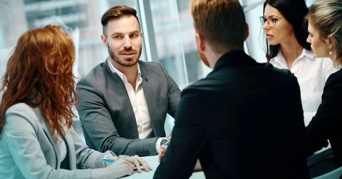 Group of business people collaborating in office Stock Footage