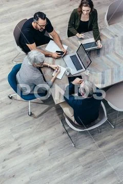 Group of business people having a brainstorming meeting Stock-Fotos