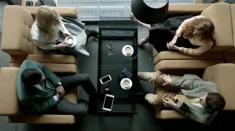Group of business people having a chat at a cafe. Stock Footage 61158005