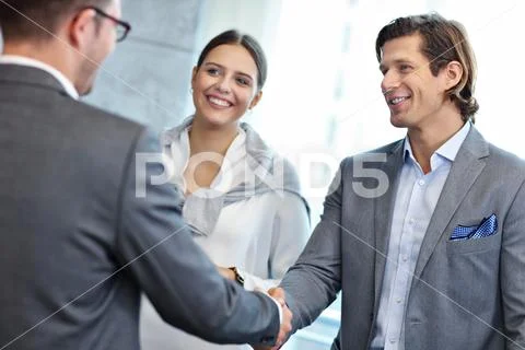 Group of business people introducing one another Stock Photos