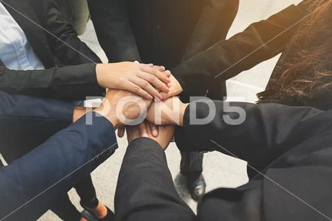 Group of business people joining hands. Team work concept. Stock Photos