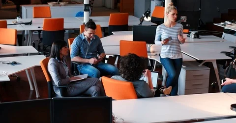 Group Of Business People Meeting Around Table in startup office Stock Footage