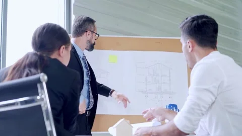 Group of business people or engineer team meeting brainstorming discussion Stock Footage 155200645