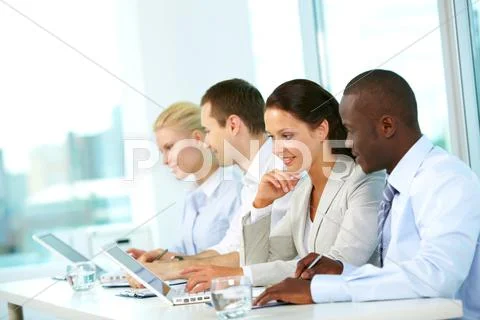 Group of business people planning work in office Stock Photos