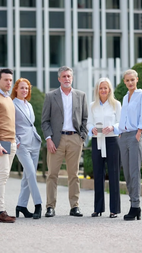 Group of business people smiling while standing together Stock Footage 237626141