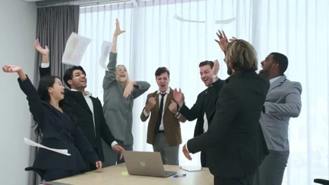 Group of business people throwing documents greeting success at meeting room. Stock Footage 245749429