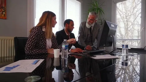 Group Of Business People Using Computer At Meeting Stock Footage 153679928