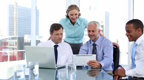 Group of business people using laptop and tablet computer Stock Footage