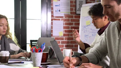 Group of businesspersons having different age working in the office Video stock 142496322