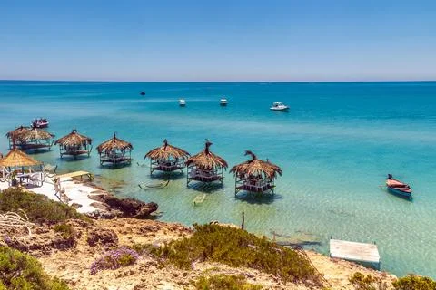 Group of Cabanas on Coco Beach in Bizerte, Tunisia Stock Photos