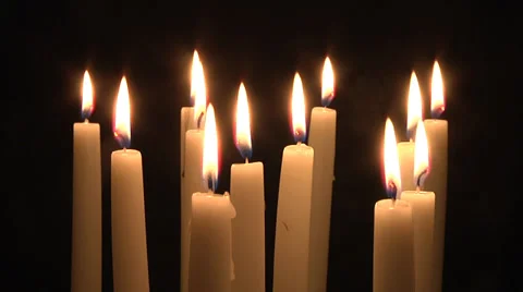 Group of candles burning Видео 32064485