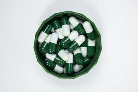 Group of Capsules Isolated on White Background Stock Photos