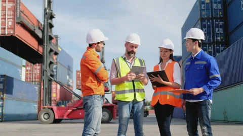 Group of cargo container workers with different color uniform and discuss Stock Footage 146468906