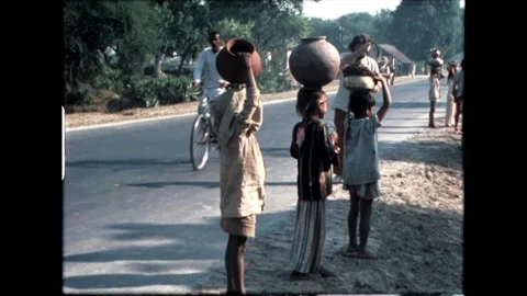 Group Carrying Pots Stock Footage 276292802