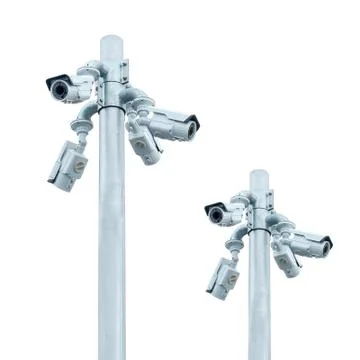 Group of CCTV on post with cloudy blue sky Stock Photos