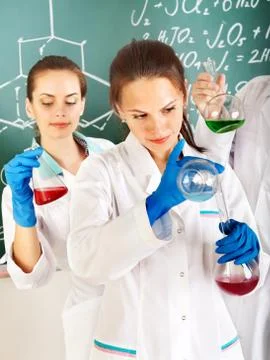 Group chemistry student with flask. Stock Photos