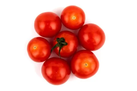 Group of cherry tomatoes on a white background. Stock Photos