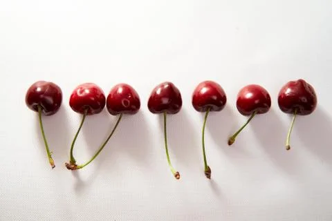 Group of cherry on a white background with shadows. Close-up. Top view. With Stock Photos