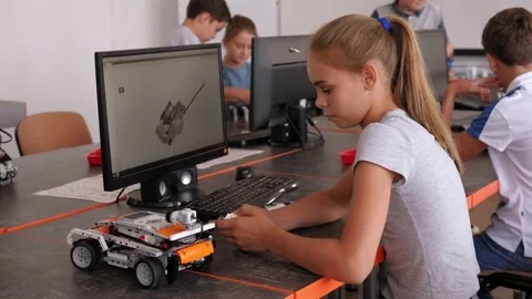 Group of children are making robots from the constructor in School of Robotics. Stock Footage 142011121