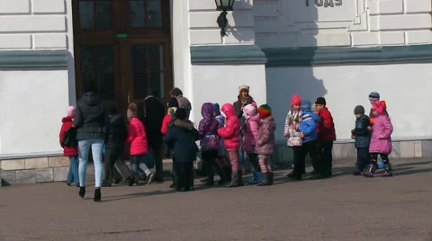 A group of children come into the building Stock-Footage 49053583