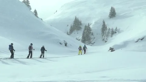Group of children doing ski touring with a guide instructor. Stock Footage 150679672
