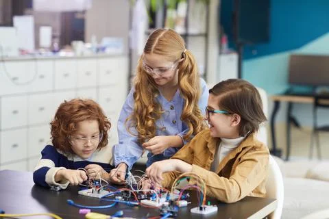 Group of Children Enjoying Engineering Class in School Stock Photos