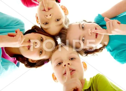 Group of children fingers on lips making silence Stock Photos