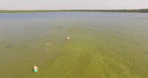 Group of children having fun at the lake Stock Footage 85318146