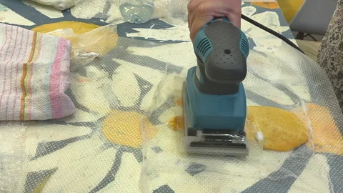A group of children makes a toy from wool, squeezes out water with a machine, th Stock Footage 306538408
