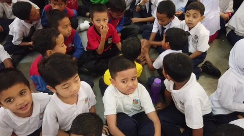 Group of children playing together in school Stock Footage 119682105