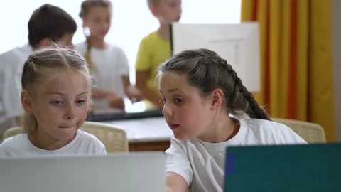 Group of children at school online learning. Teamwork of children with laptop Stock Footage 255236623