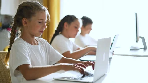 Group of children at school online learning. Teamwork of children with laptop Stock Footage 272208618