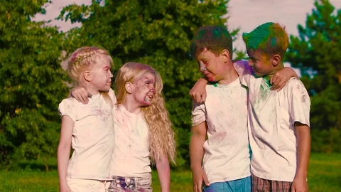 Group of children standing in couples, looking at each other intently and Stock-Footage 70879105