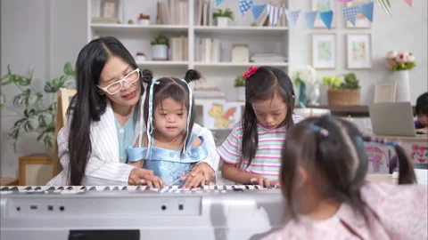 A group children of students doing activities singing and dancing Stock Footage 308061483