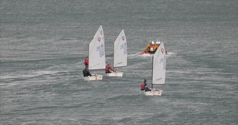 Group Of Children Taking Class Of Sailing Stock Footage 122884783